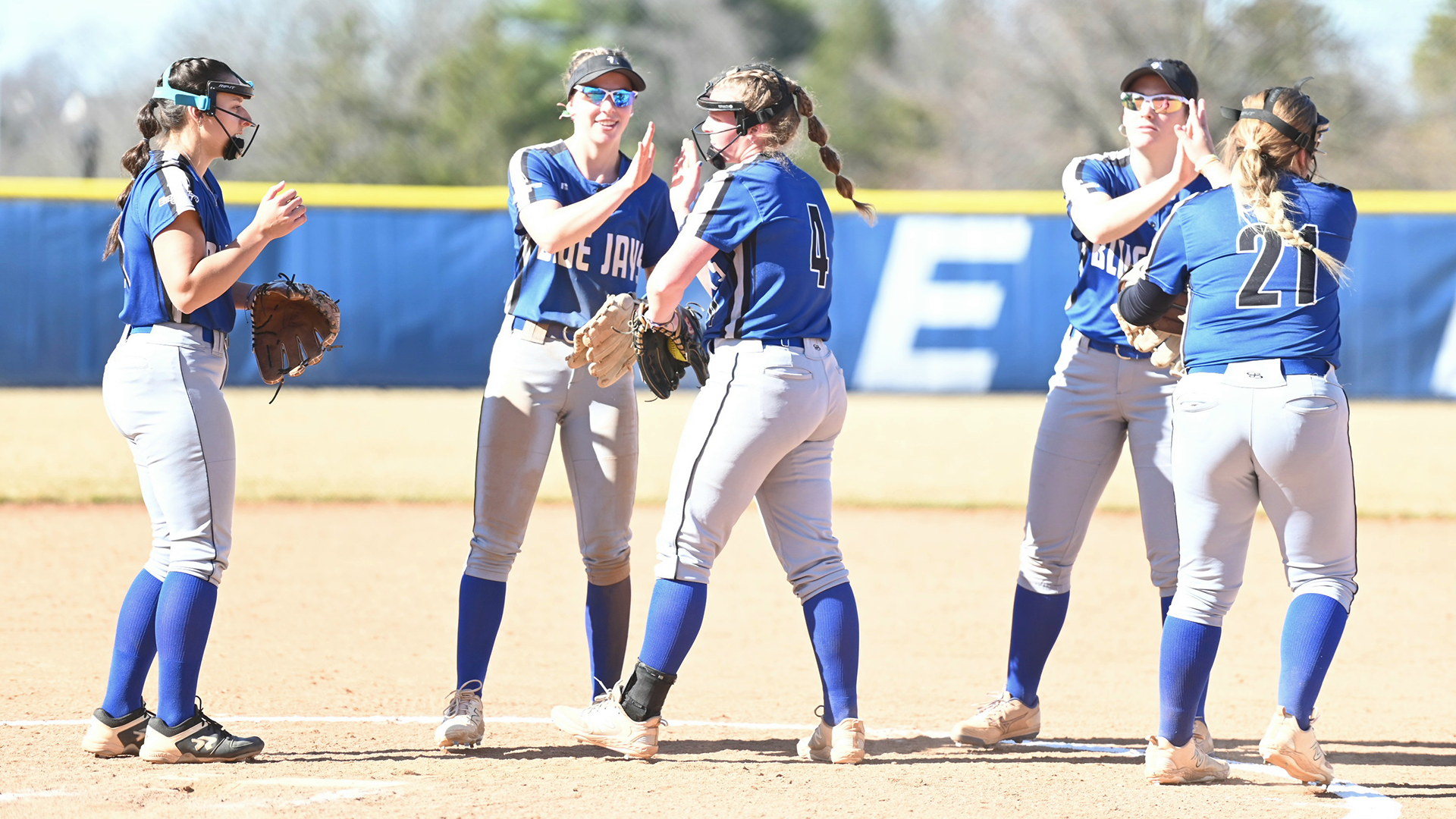 Softball high fives vs Penn State Harrisburg 031825