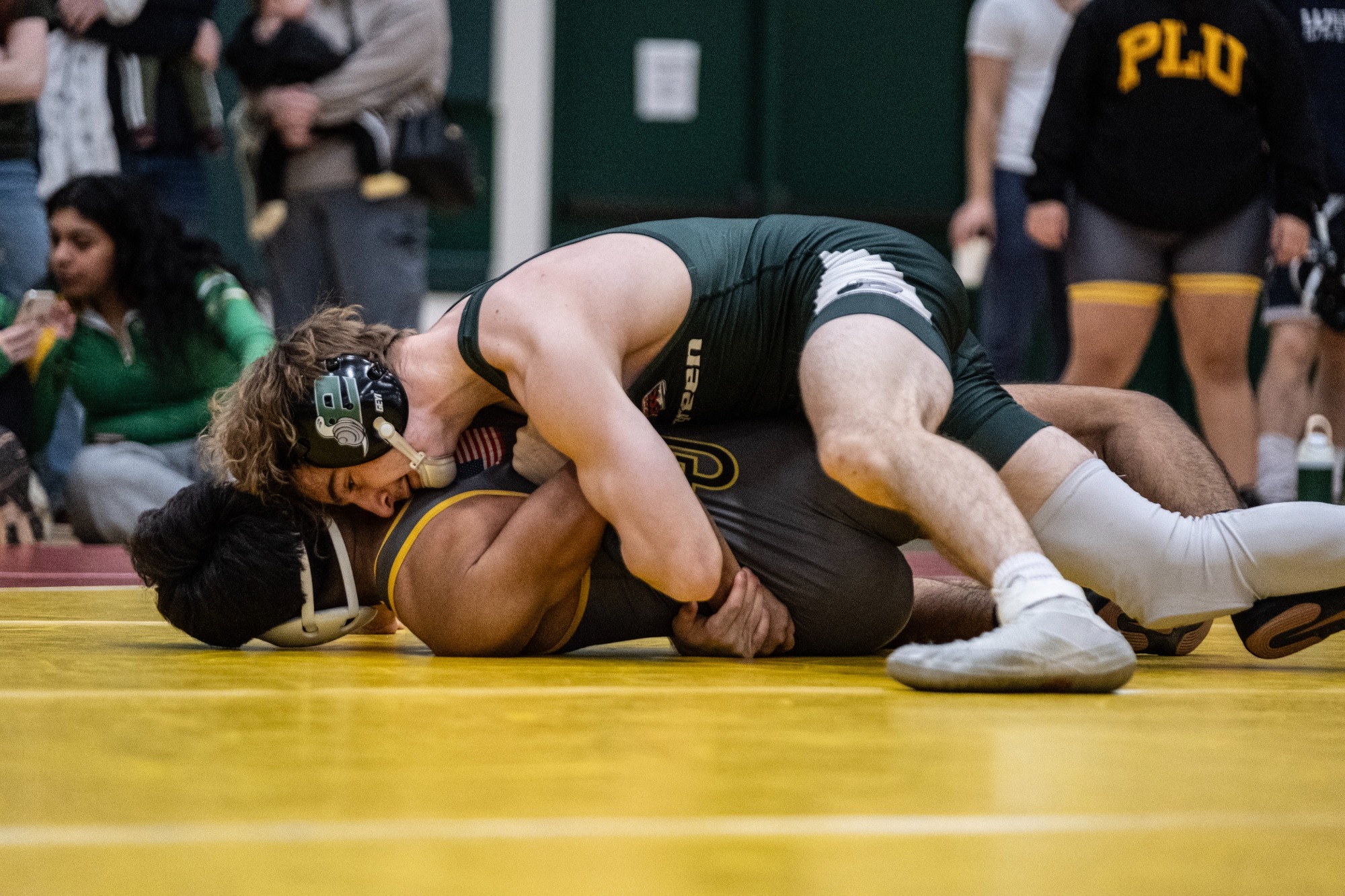 Malachi Wallway wrestles for the Evergreen Geoducks.