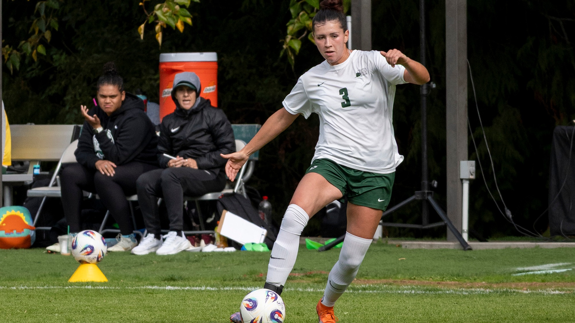 Izzy Widener controls the soccer ball for Evergreen.