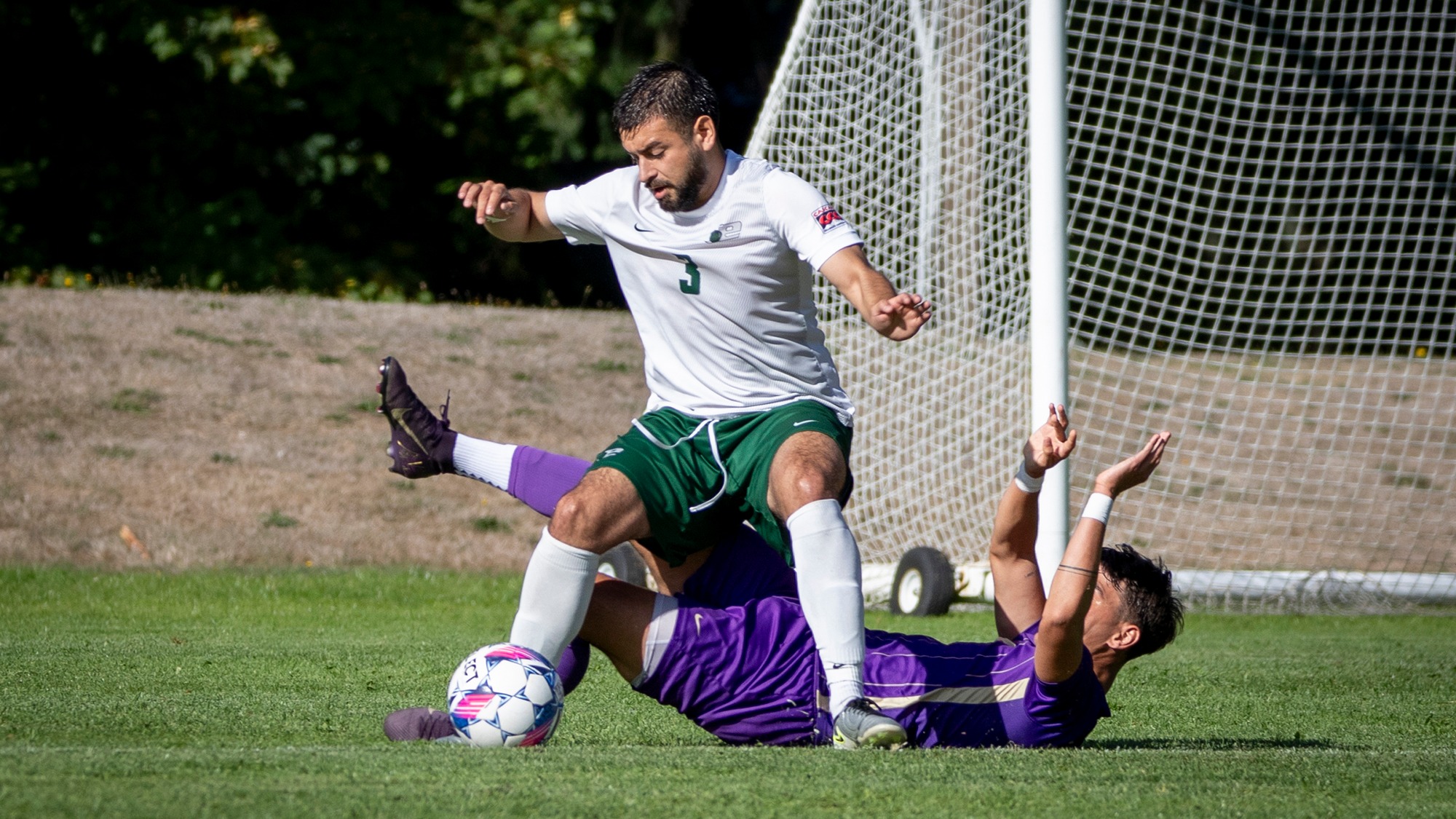 Alejandro Gallegos controls the soccer ball.