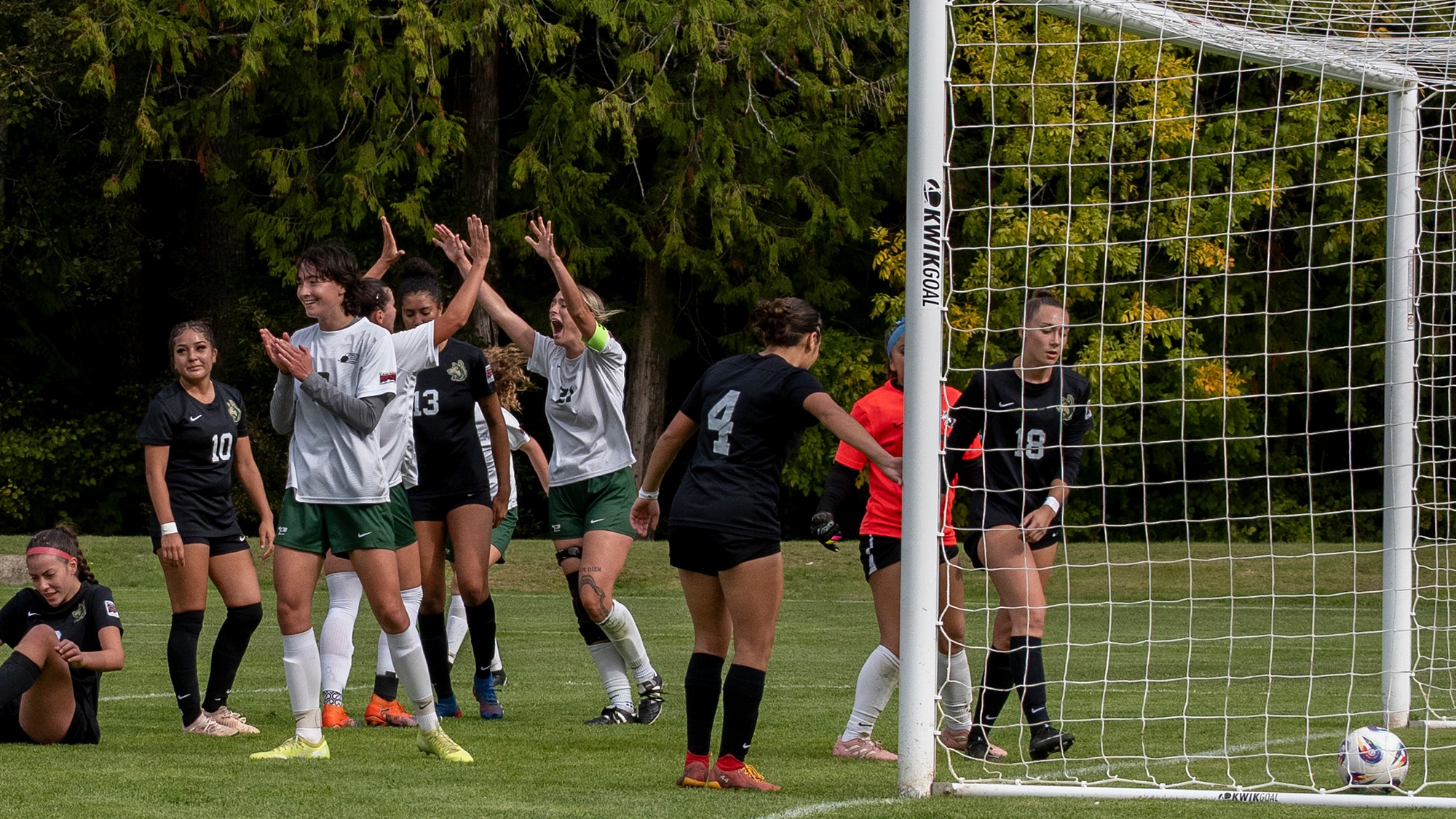 Emma Stock (#27) celebrates after scoring a goal against Walla Walla University.