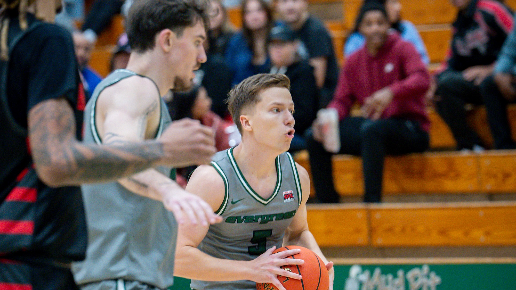 Bradley Graham looks for options to pass the ball.