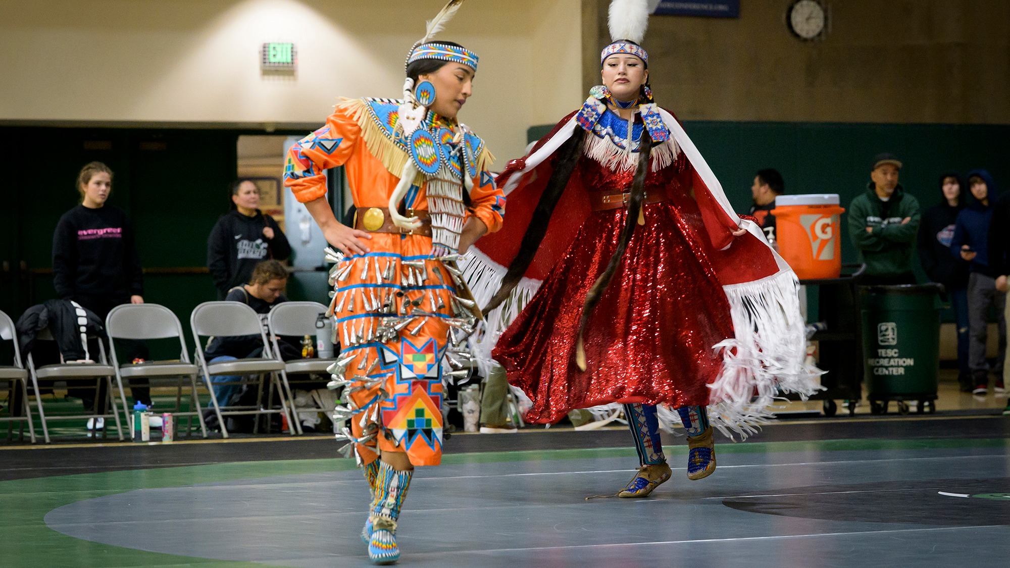 Nizhoni Tallman and Ruby Clark powwow dance on Nov. 29, 2025.