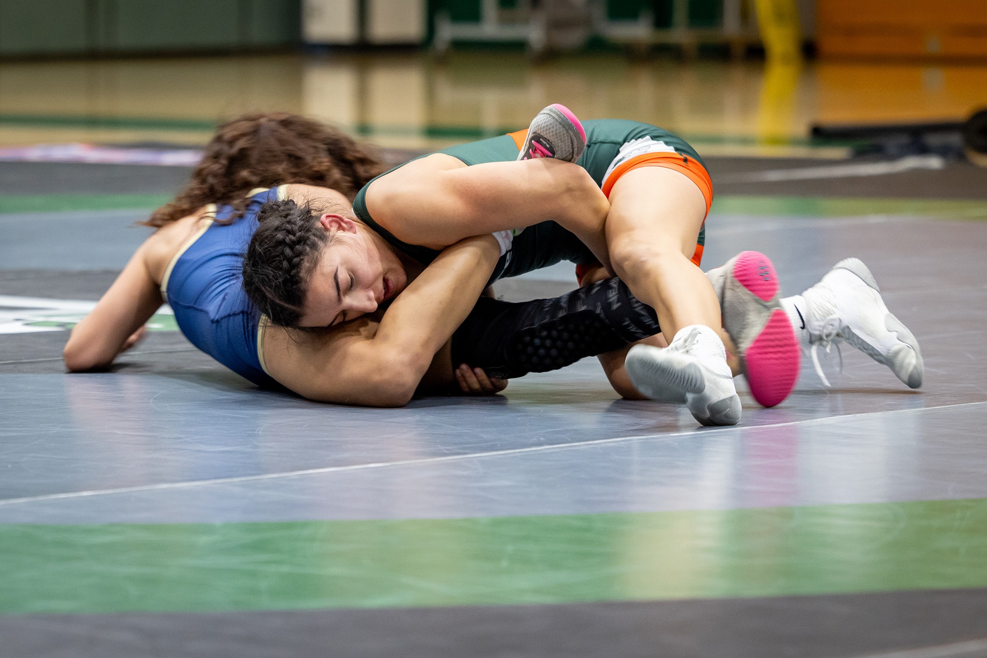 Nizhoni Tallman controls her opponent during a wrestling match.