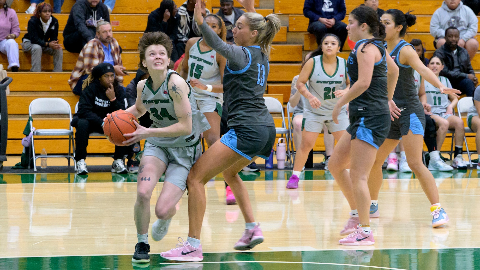 Jenna Glenzel moves into the paint near the baseline for a shot.