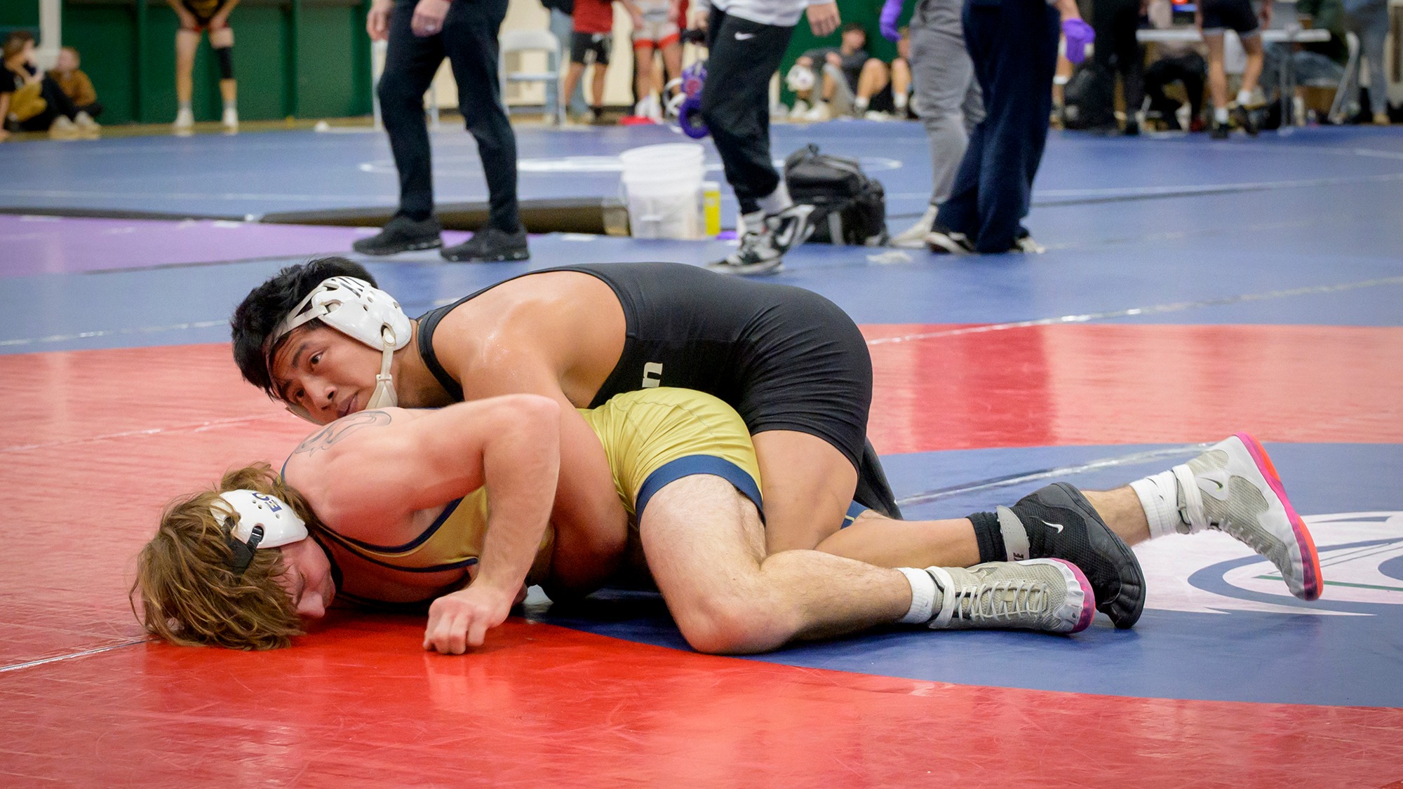 Horacio Godinez wrestles for the Geoducks.