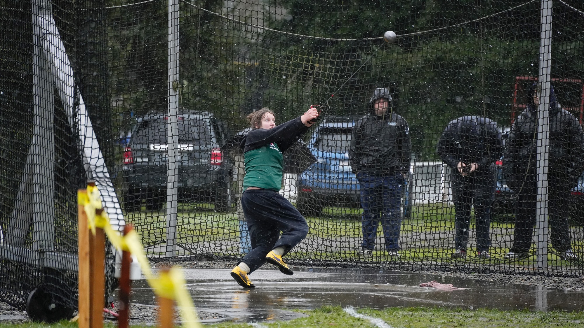 Claire Ryan competes for Evergreen in the hammer throw.