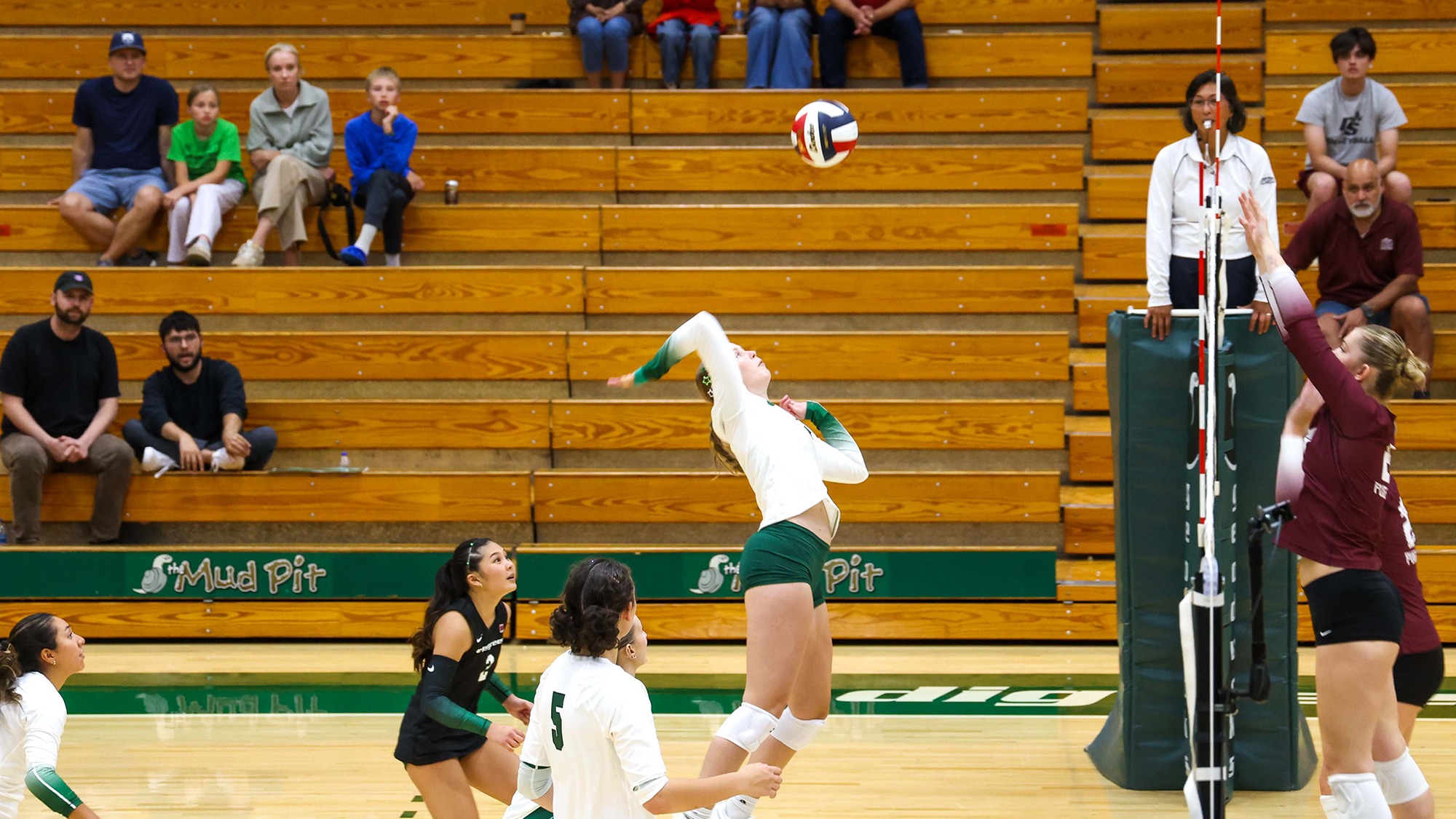 Zofia Formella hits an attack for the Geoducks.