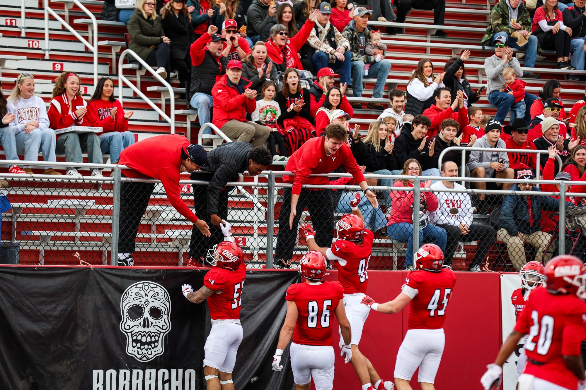 Team celebration with Fans at Roos Field
