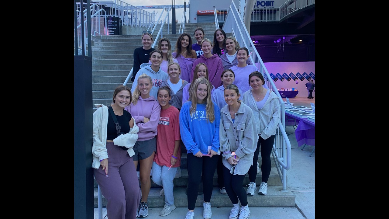 Women's Club Lacrosse Shows Support at the Domestic Violence and