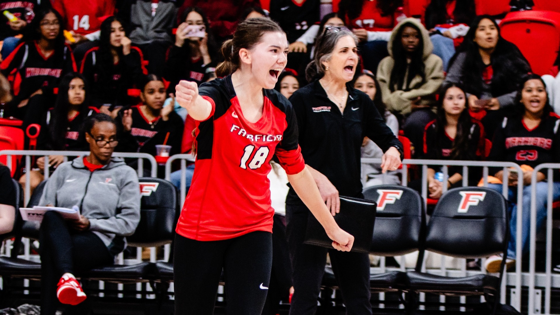 Natalie Carlin celebrates vs QU