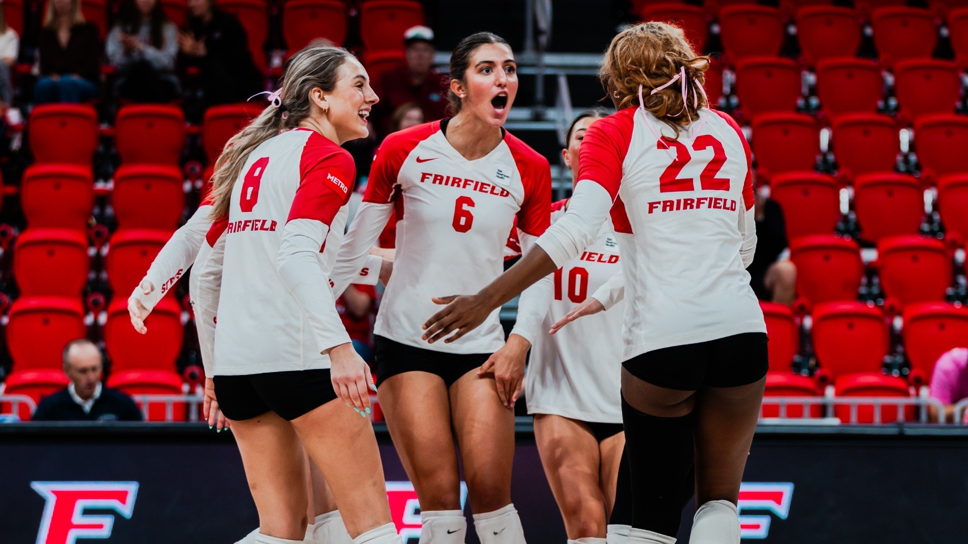 Volleyball team celebration vs Rider