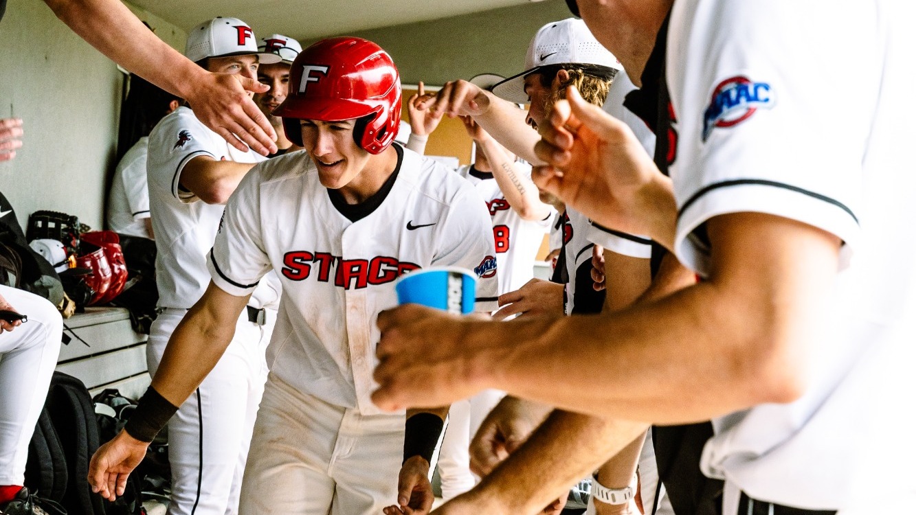 Paine celebrates in dugout