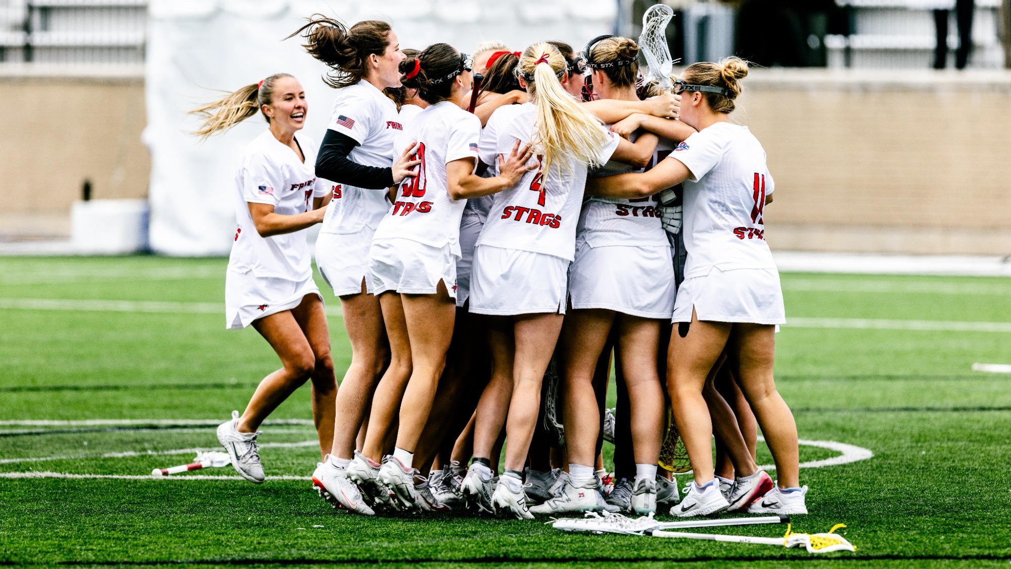 Team Huddle and Celebration in MAAC Championship Game