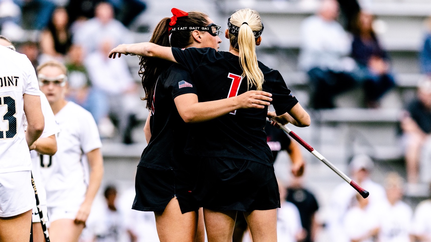 Tufano and Caputo hug in NCAA First Round
