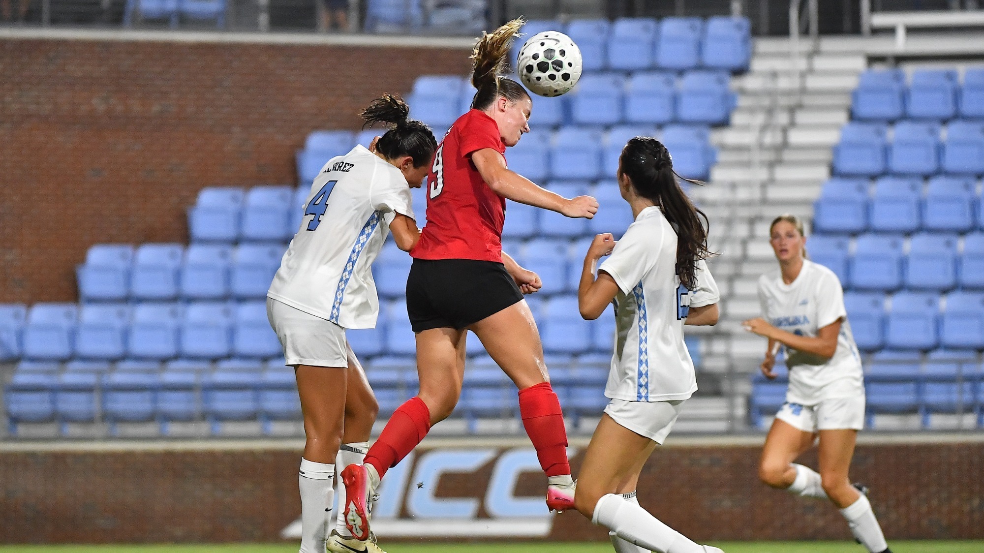 O'Connor rises for a header