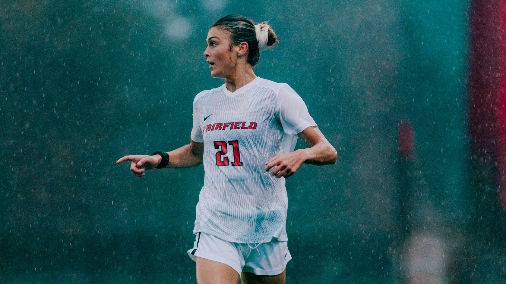 Moser holds the ball against BU