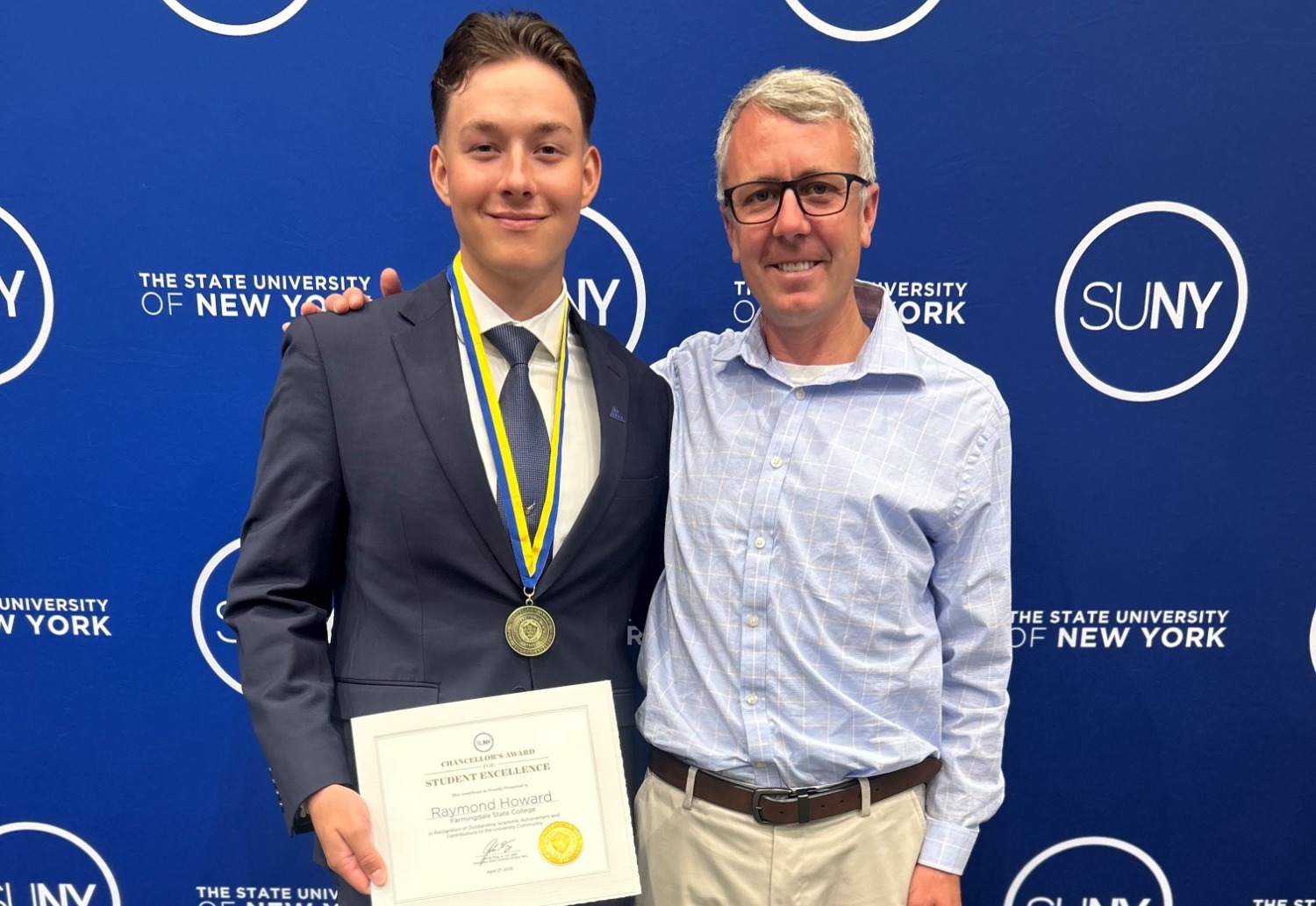 2026 Men's Golf - Raymond Howard earns SUNY Chancellor's Award - Pictured with Coach Williams