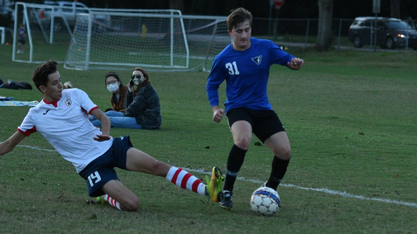 Mount gets around the sliding defender