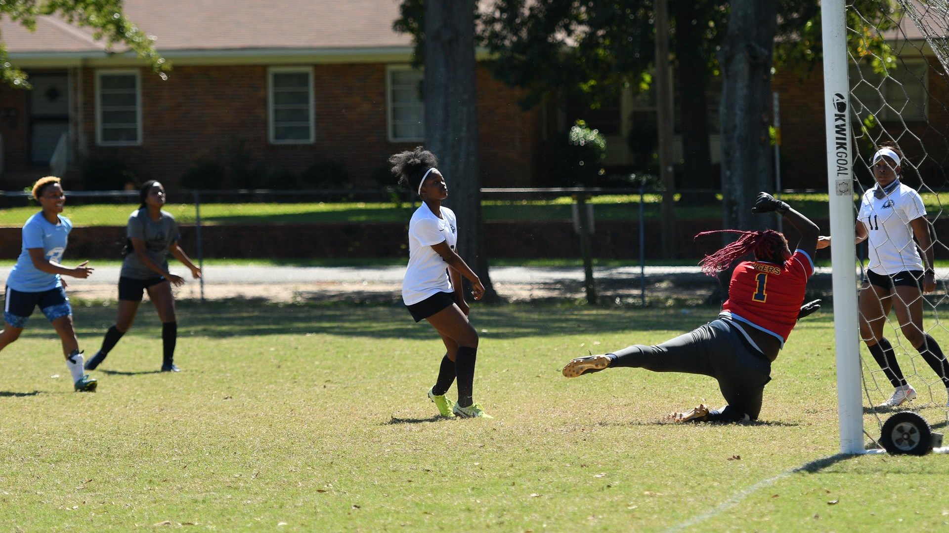 Layla Eason watches her header fly over the keeper and in