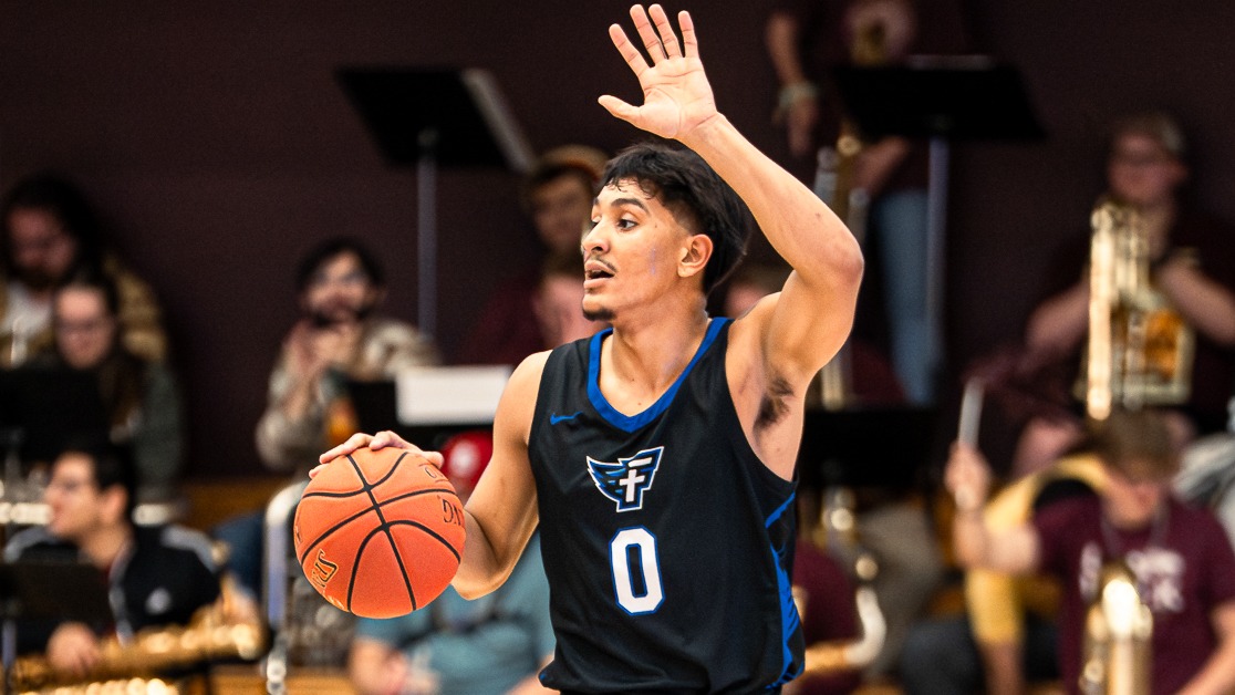 Harris calls out the play at Freed