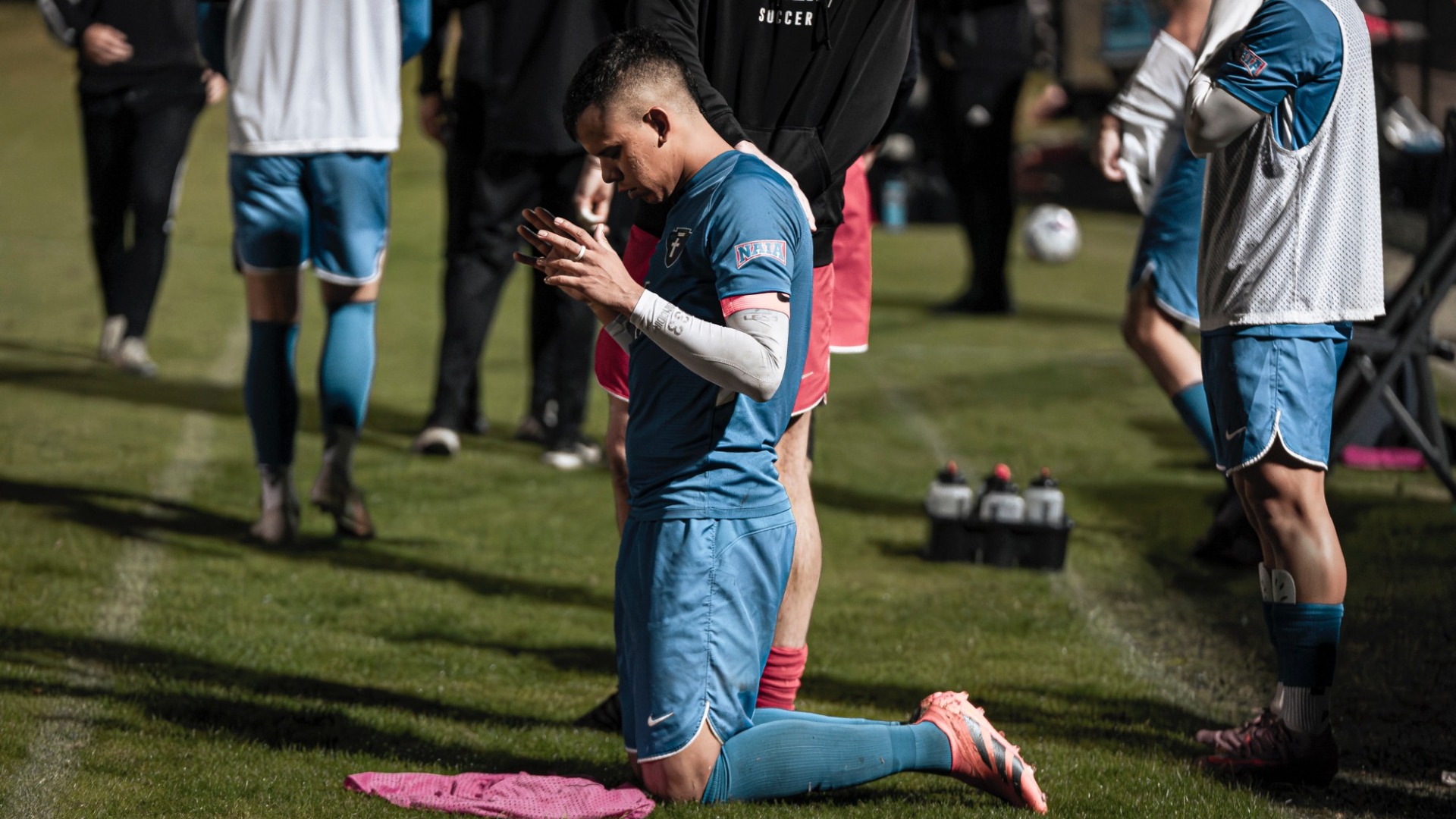 Tamayo prays following the loss to WCU in the SSAC Semis