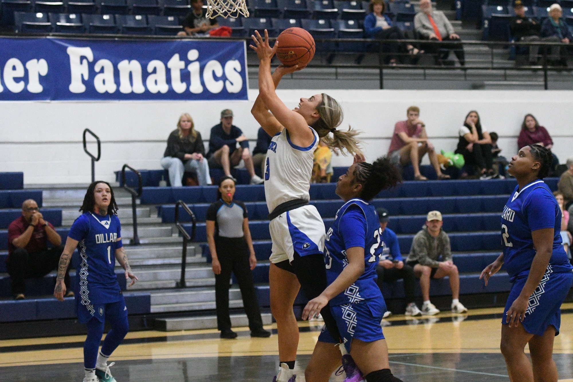 Morgan Holland DeWitt scoring on Dillard players