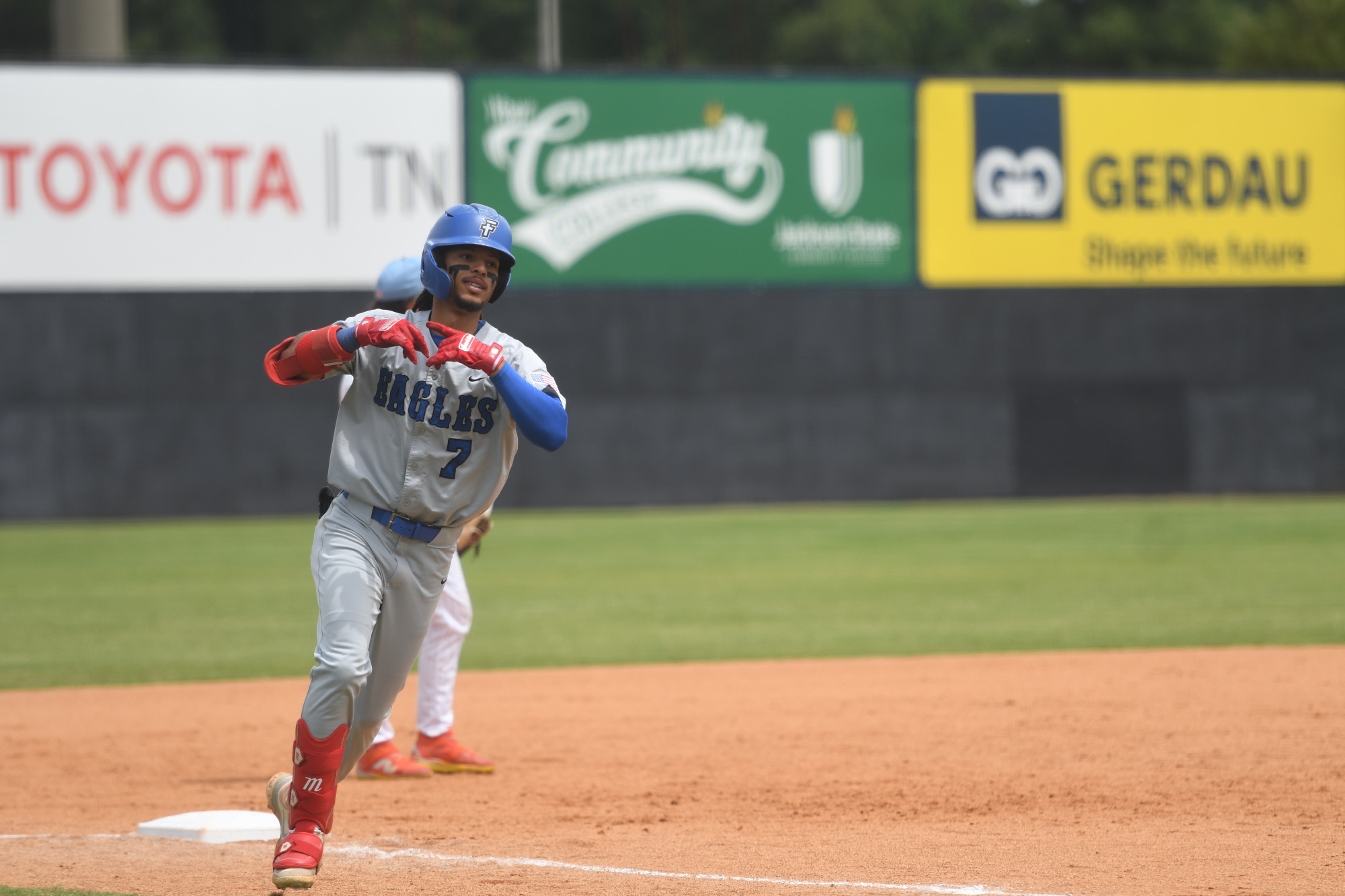 Jeyson Polanco rounding third on his way home after solo homerun. 
