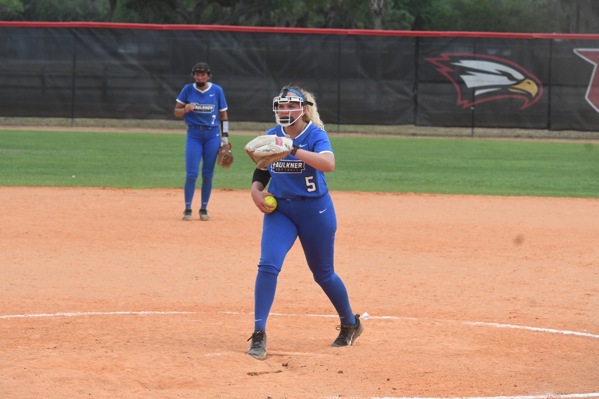 Reece Patterson prepares to pitch in NAIA Opening Round vs Evangel