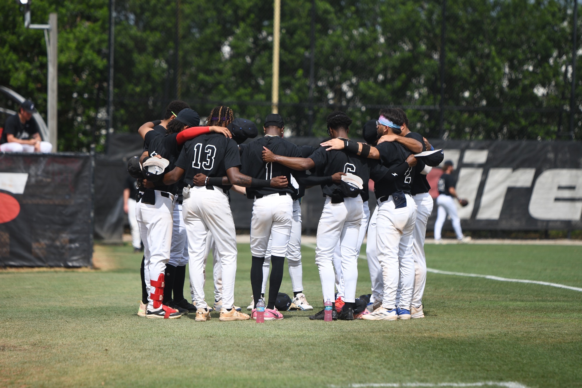 Team hudled up before start of game vs. Milligan 