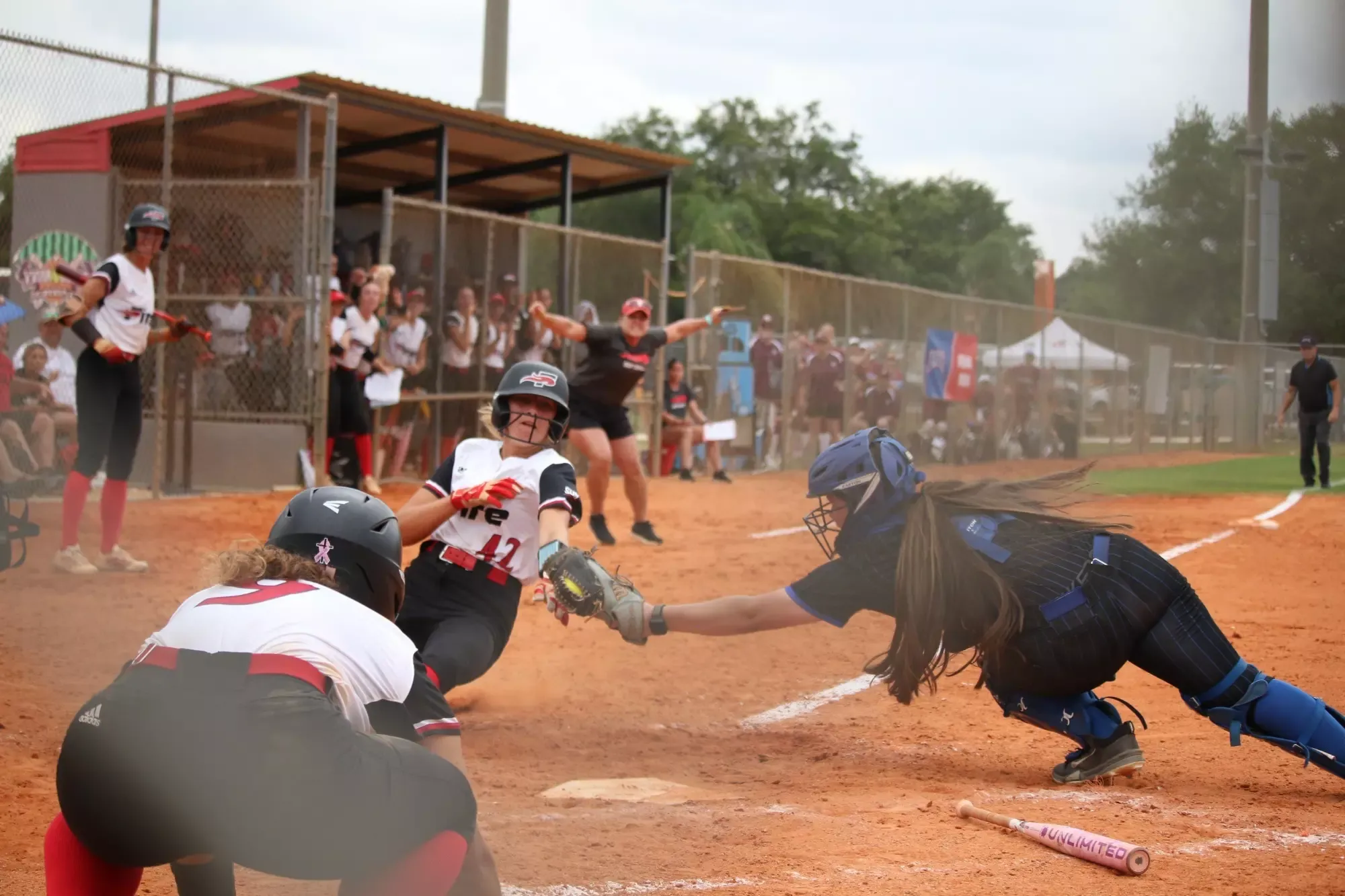 Sarah Williams tags out the tying run to save the semifinal game
