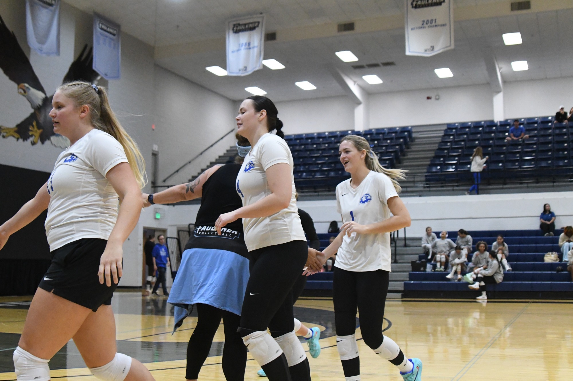 Coach Renda high-fives heading into timeout
