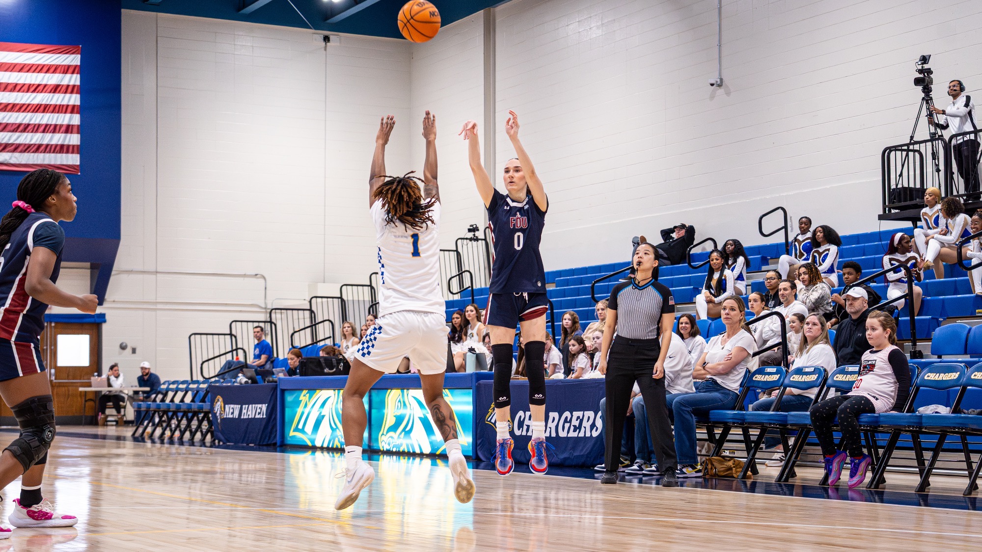 Madlena Gerke shoots a three-pointer against New Haven