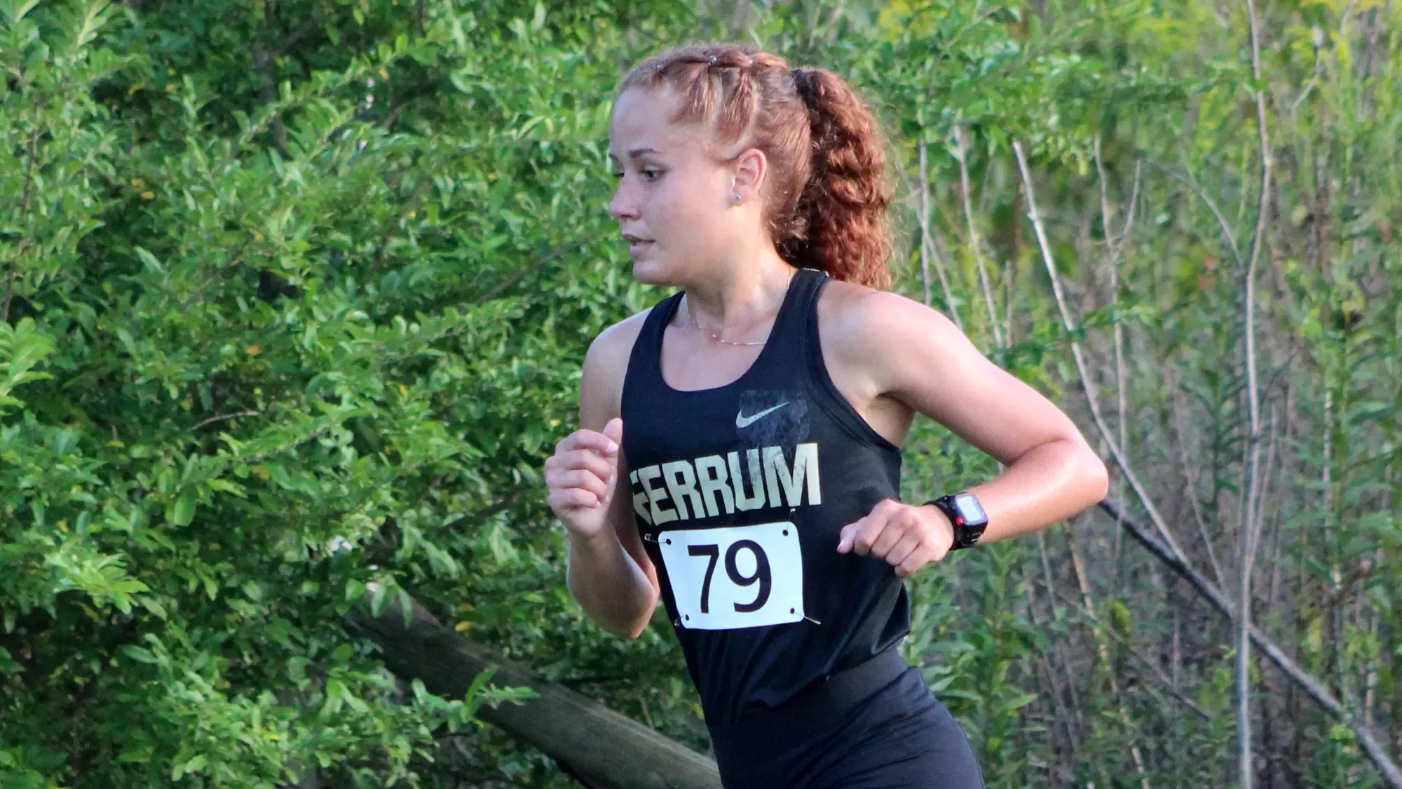 Genesis Pineiro in action for the Women's Cross Country team. 