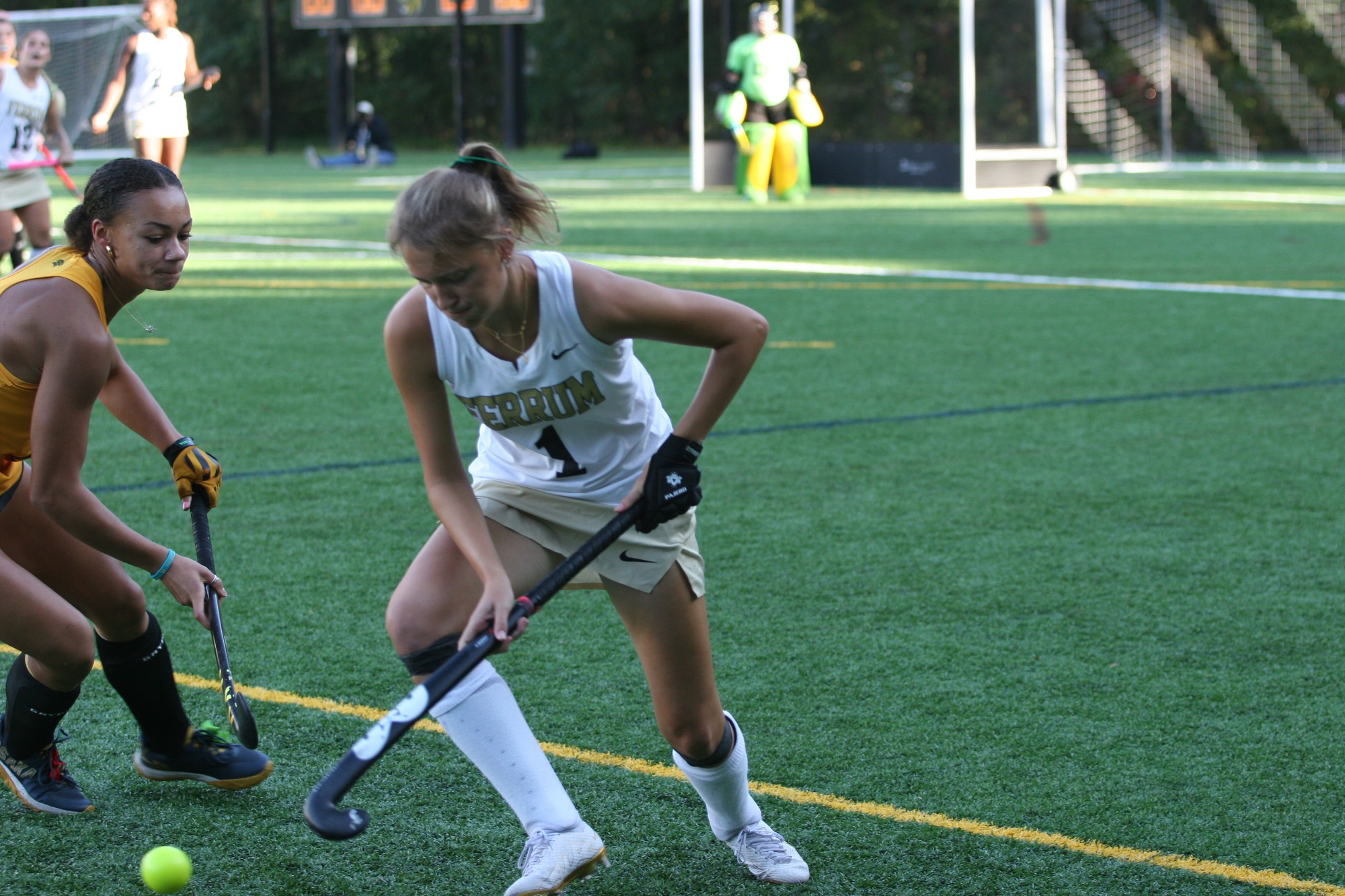Kamryn Bailey fighting for ball possession in a home Field Hockey game for the Panthers. 