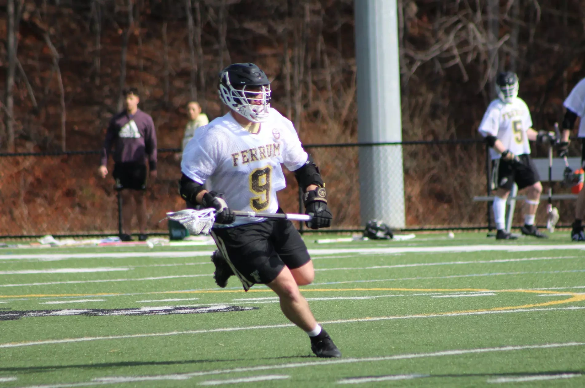 Tommy Jackson goes on the attack for Ferrum in a home men's lacrosse game on February 19, 2023. 