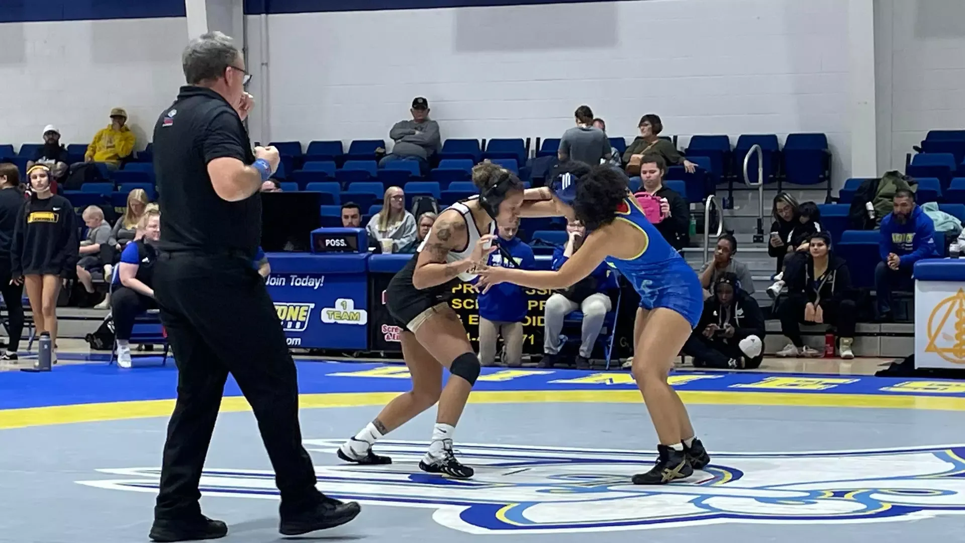 Jordan Wilson representing the Women's Wrestling Team in a tournament. 