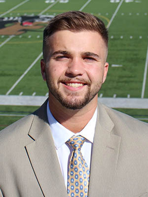 Head Men's and Women's Tennis Coach Noah Hughes