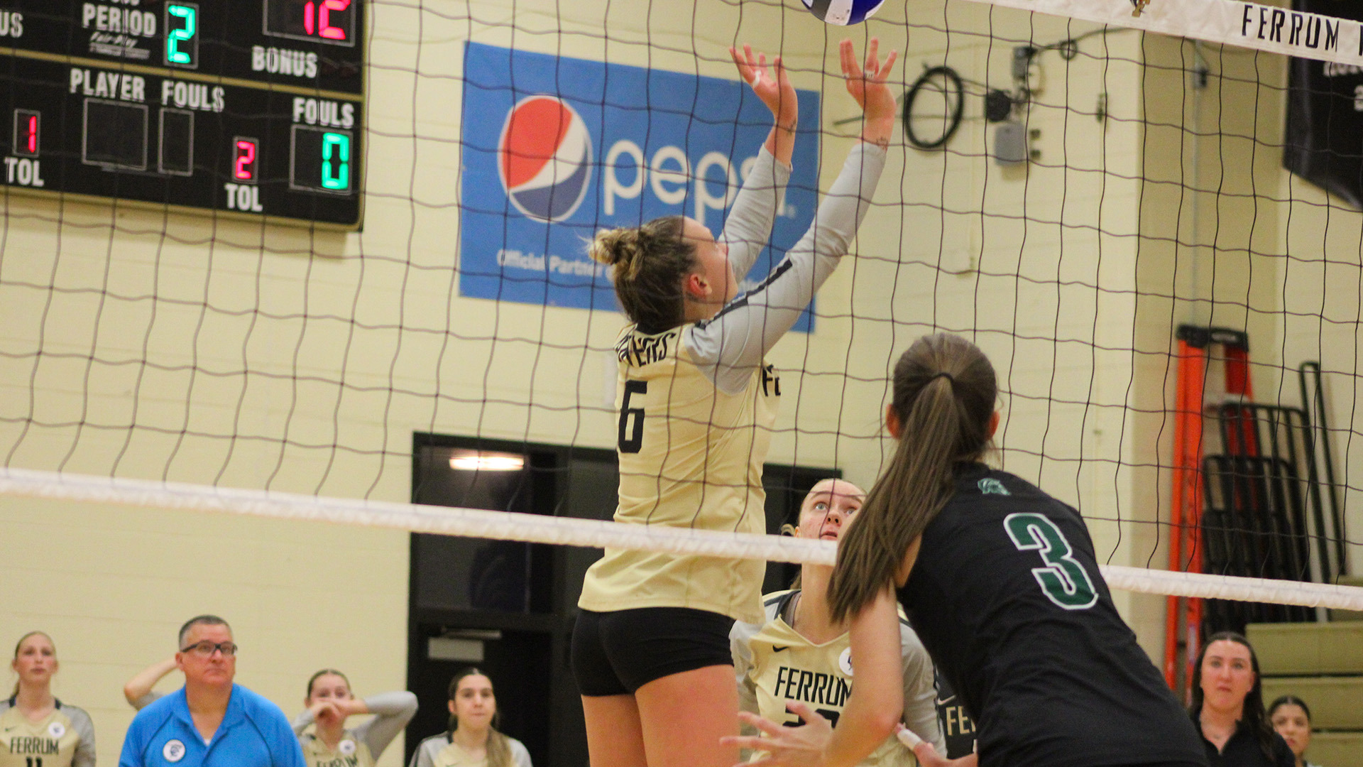 Harleigh Propst sets a ball for Ferrum during the 2025 season. 