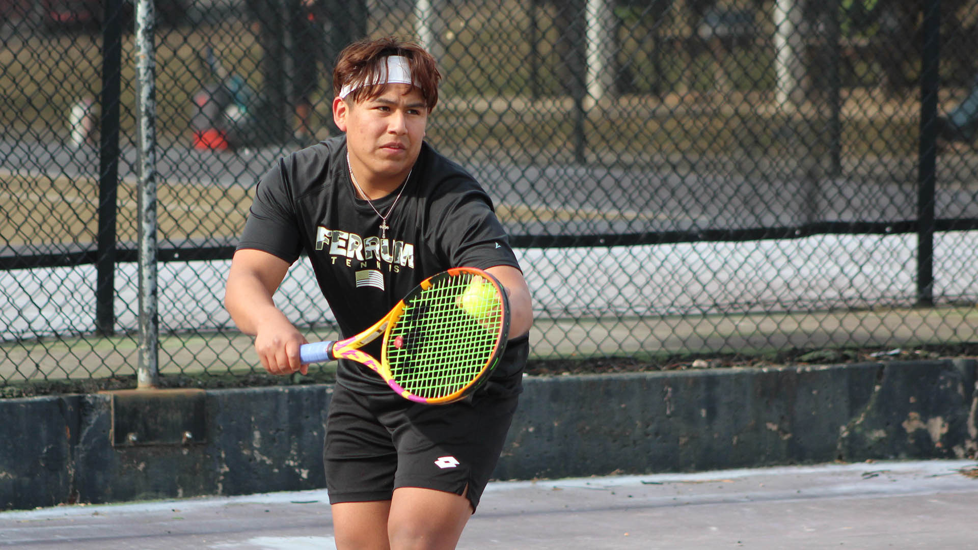Jairo Herbas prepares to serve in a home match on February 18, 2025. 