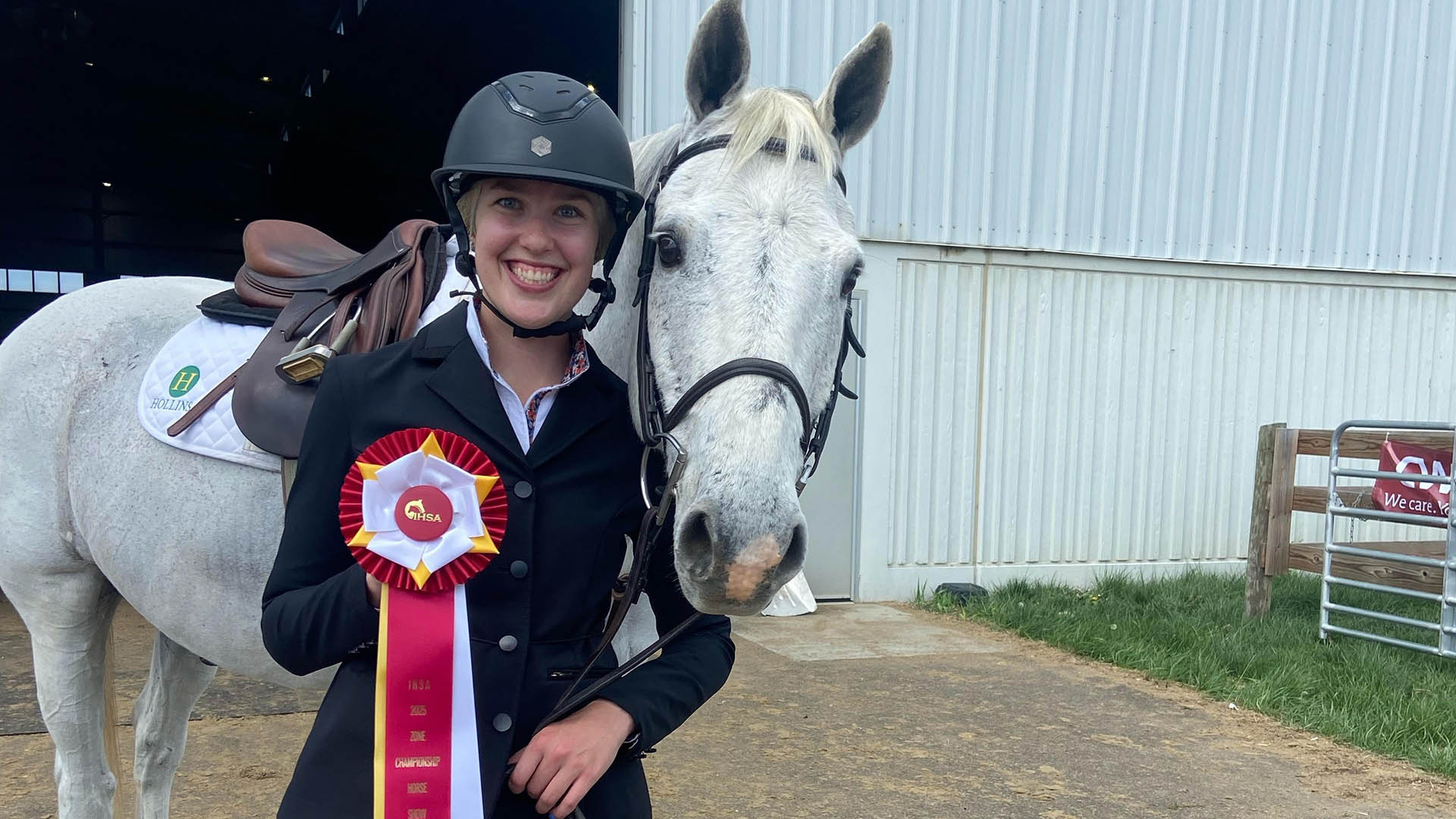 Ferrum's Abby McGuire displays her ribbon from IHSA Zone Finals April 5, 2025. 