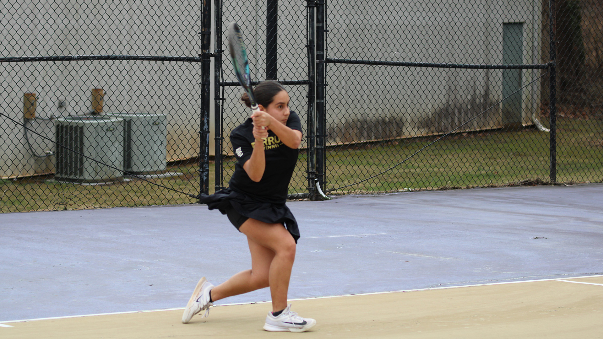 Ferrum's Stephanie Porras rips a backhand in a home match on February 21, 2026. 
