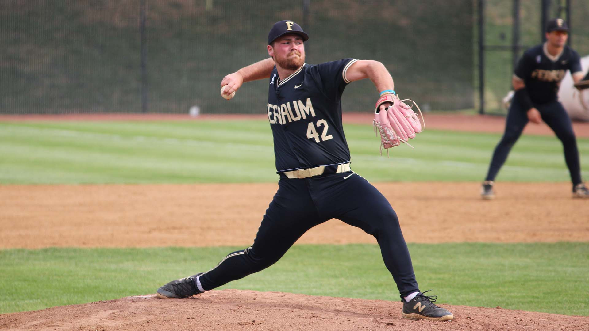 Senior Steven delivers a pitch against Shorter March 20, 206 at home. 
