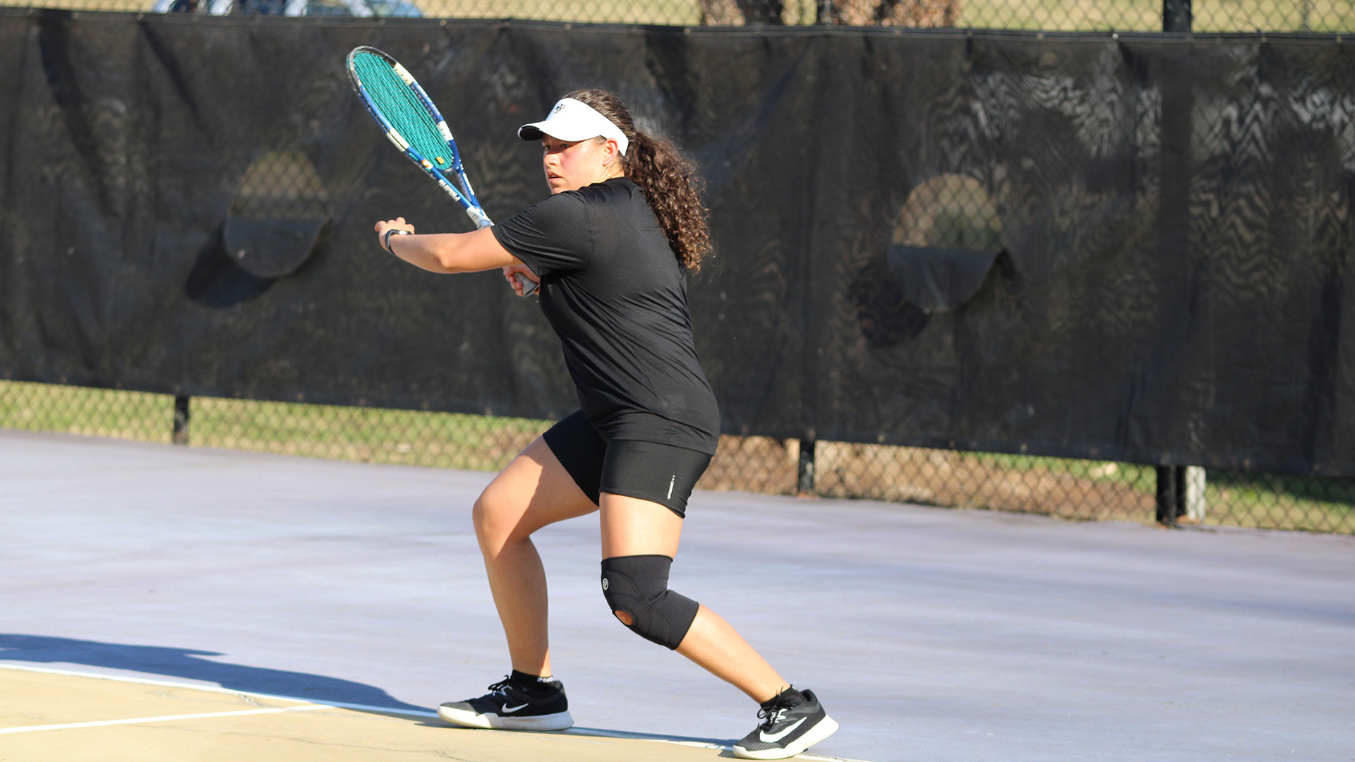 Bianca Solorzano gets ready to hit a forehand in a home match on MArch 5, 2026. 