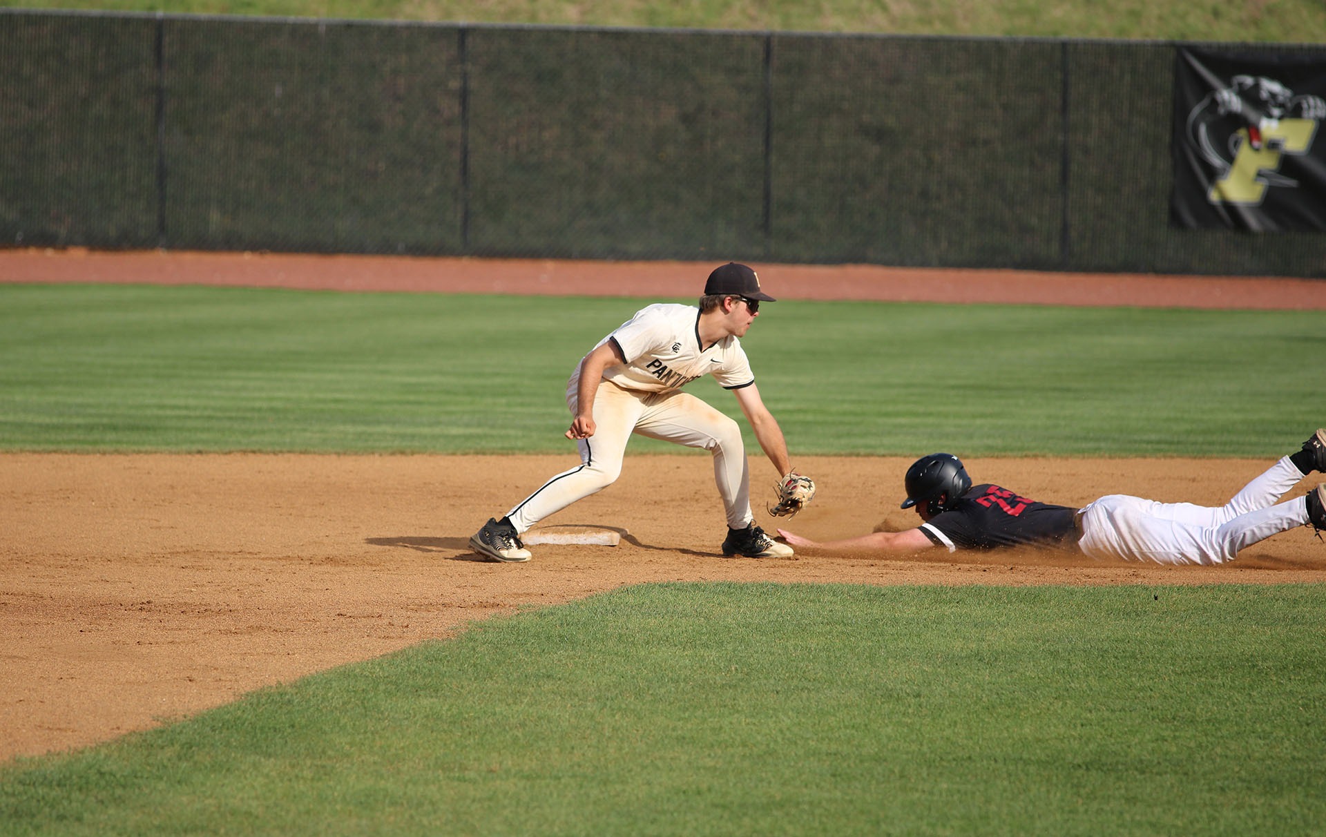 CJ Kemmerer tags a runner out at second.