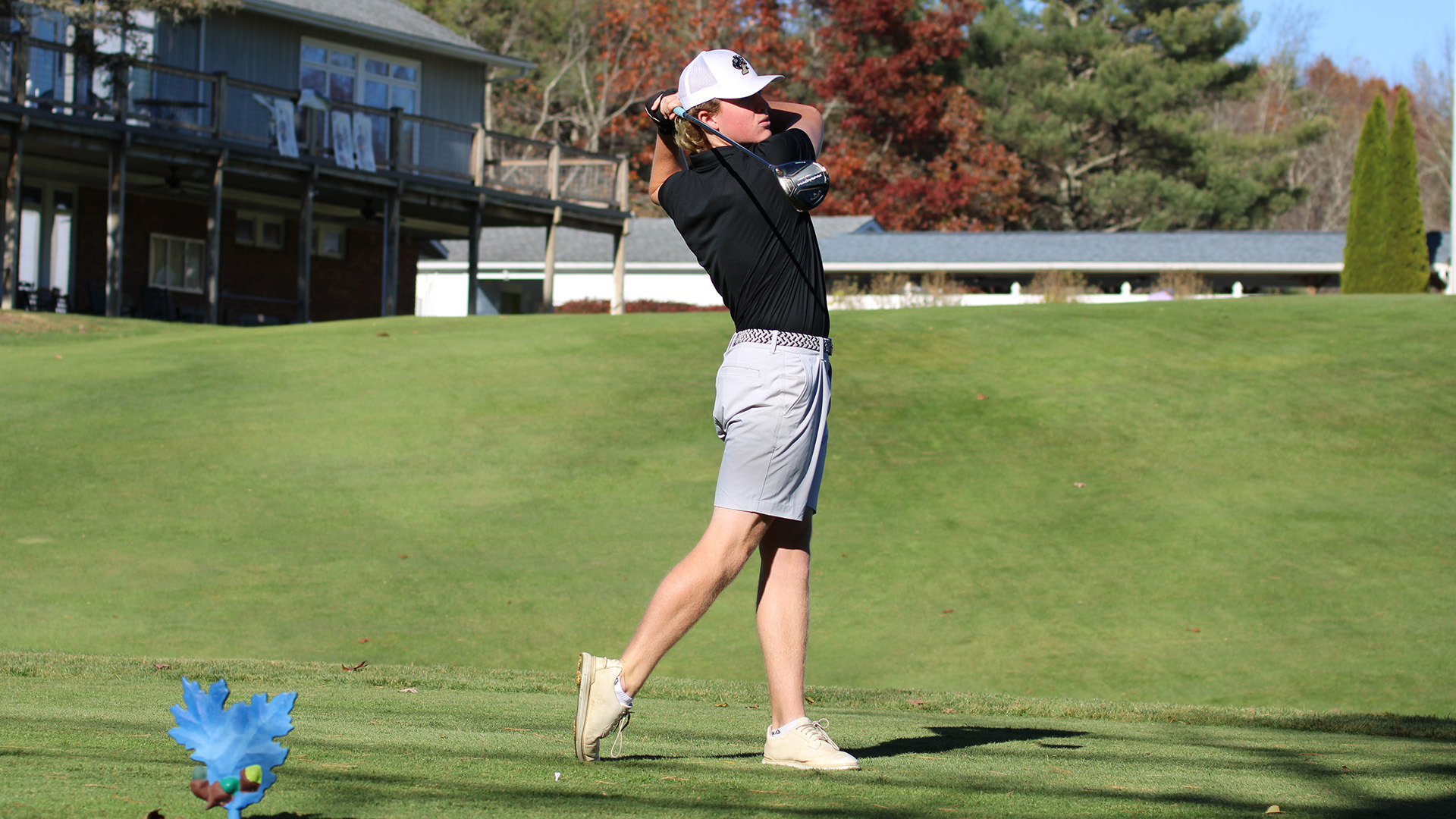 Jake Chavis tees off in a practice round in October 2026.
