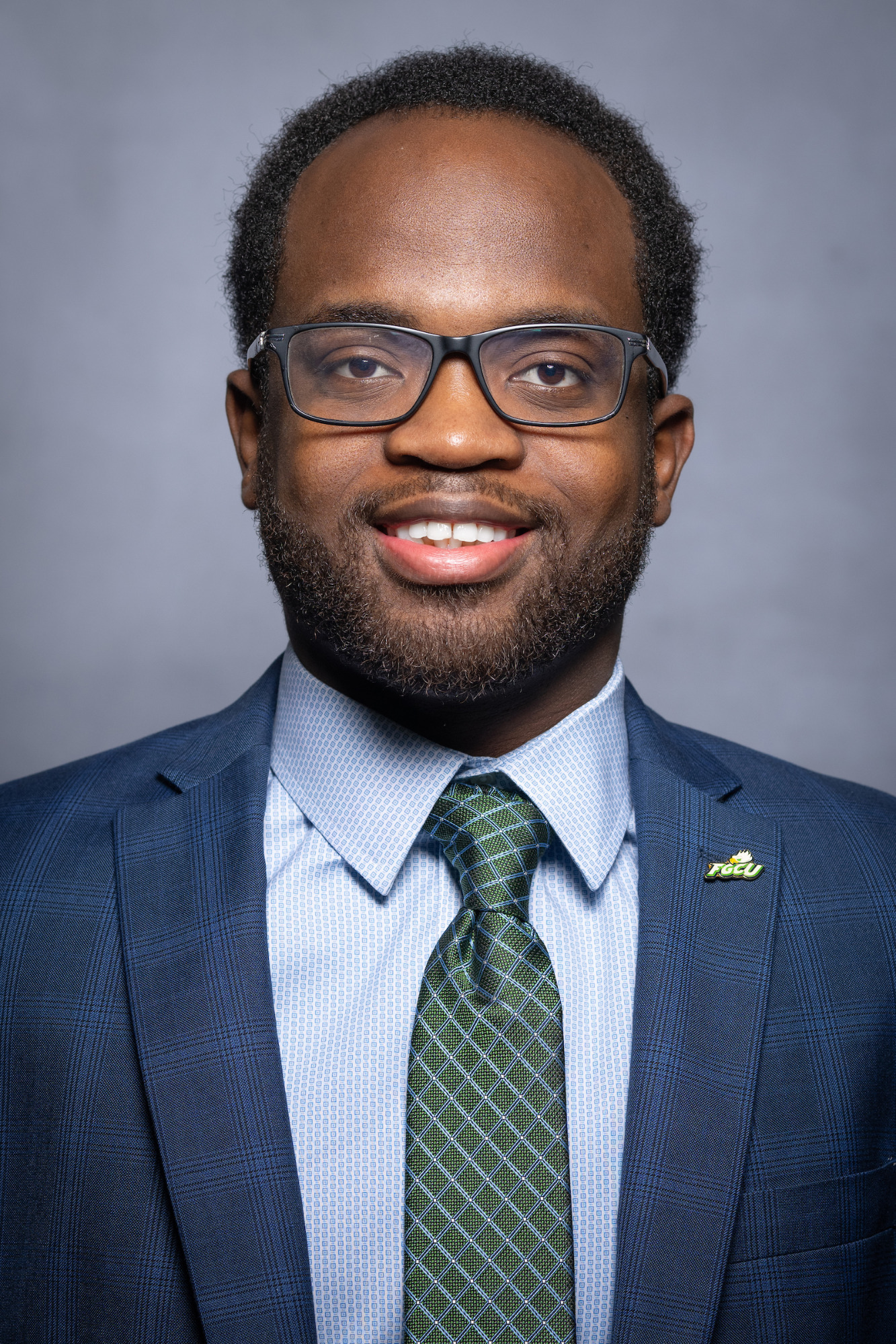 An african-american man in a nice suit.