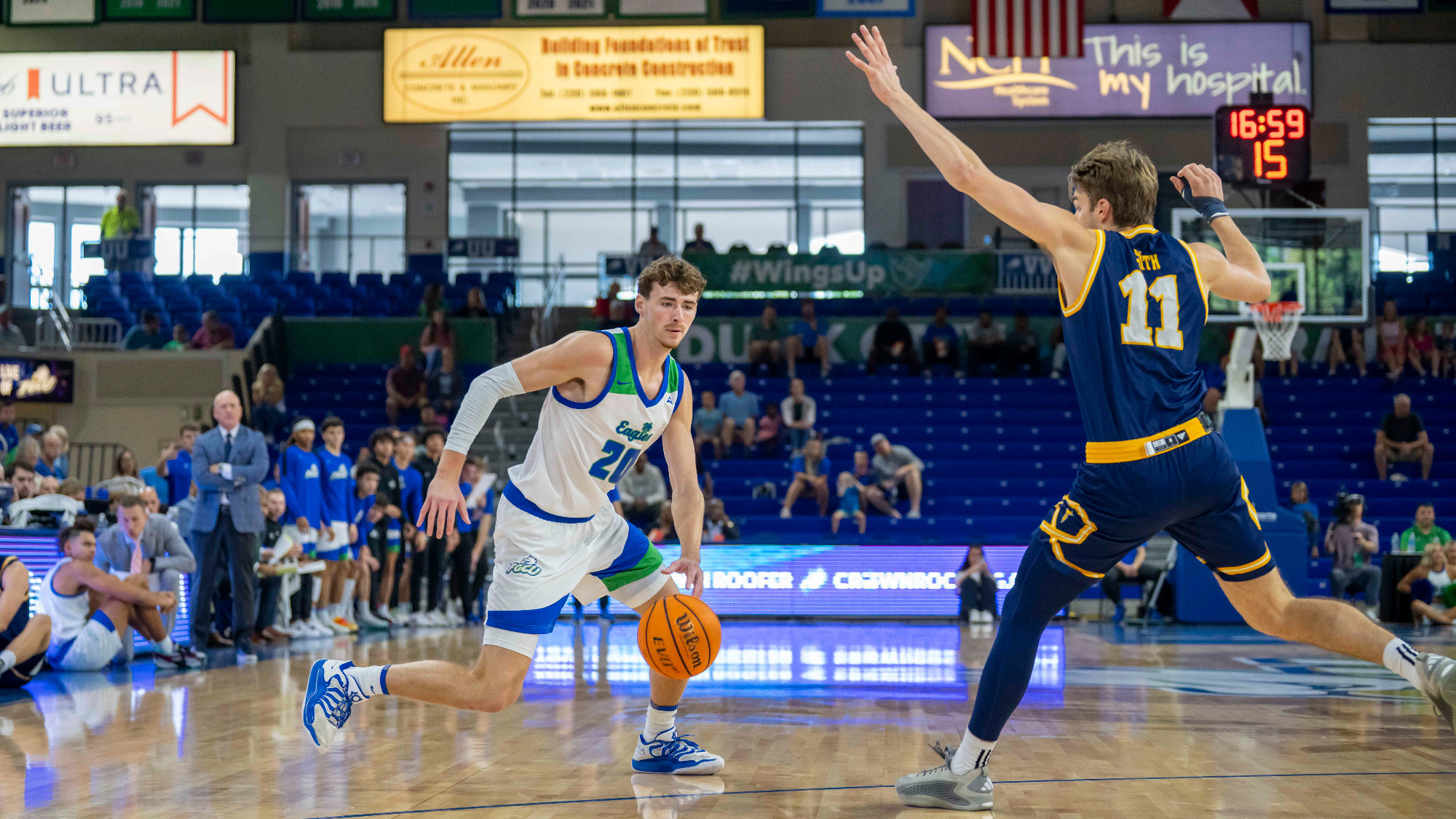 JR Konieczny drives to the basket against Chattanooga