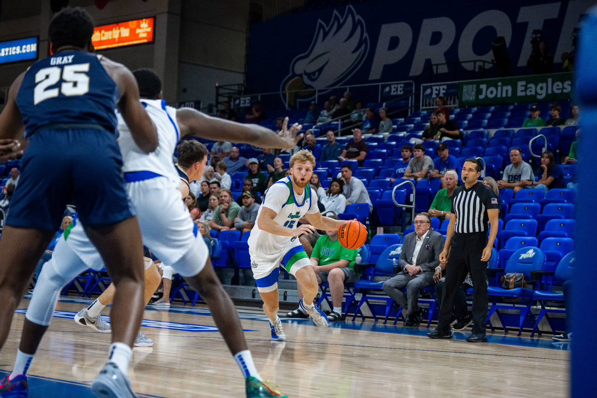 Michael Duax drives to the basket