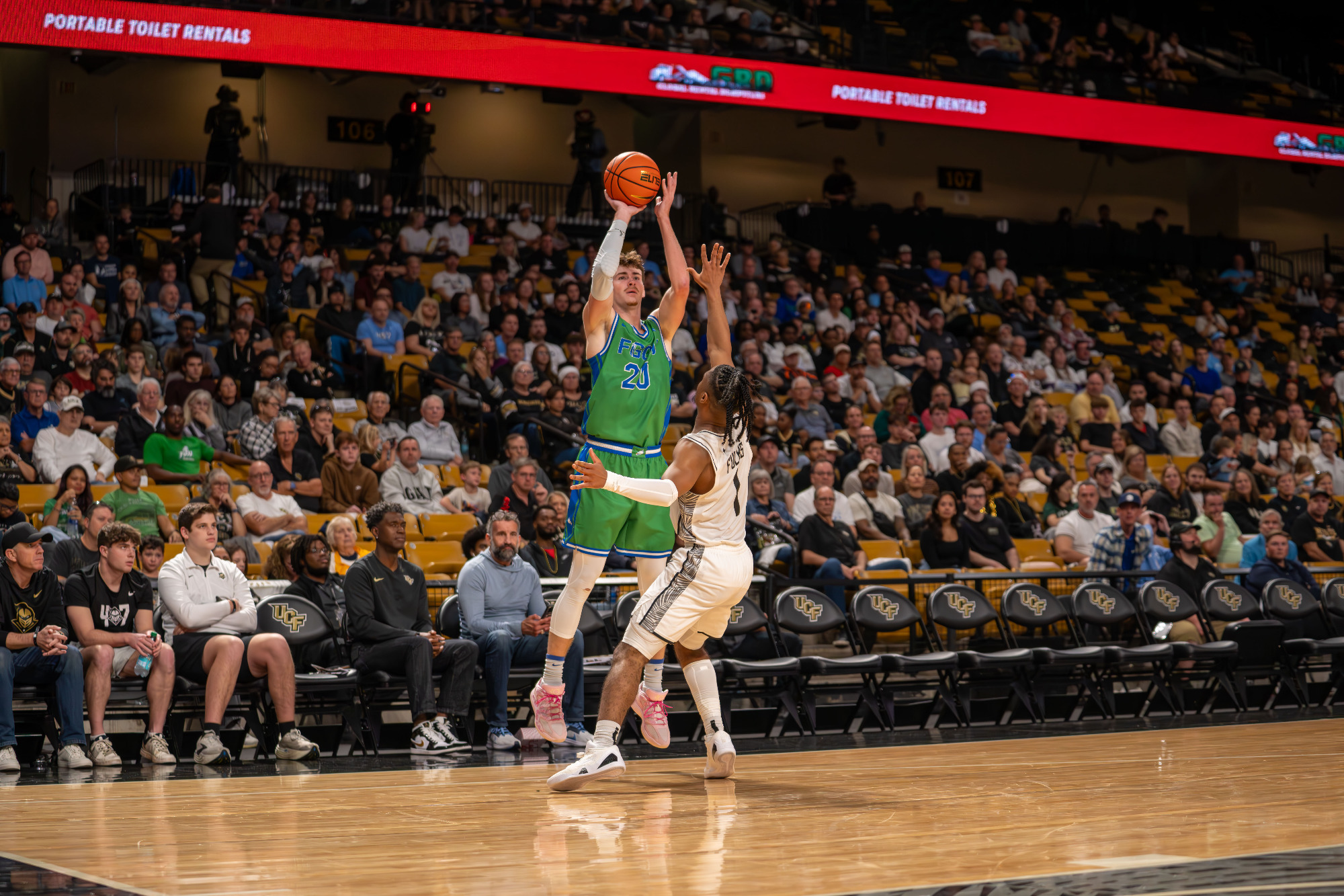 JR Konieczny makes a 3-pointer against UCF
